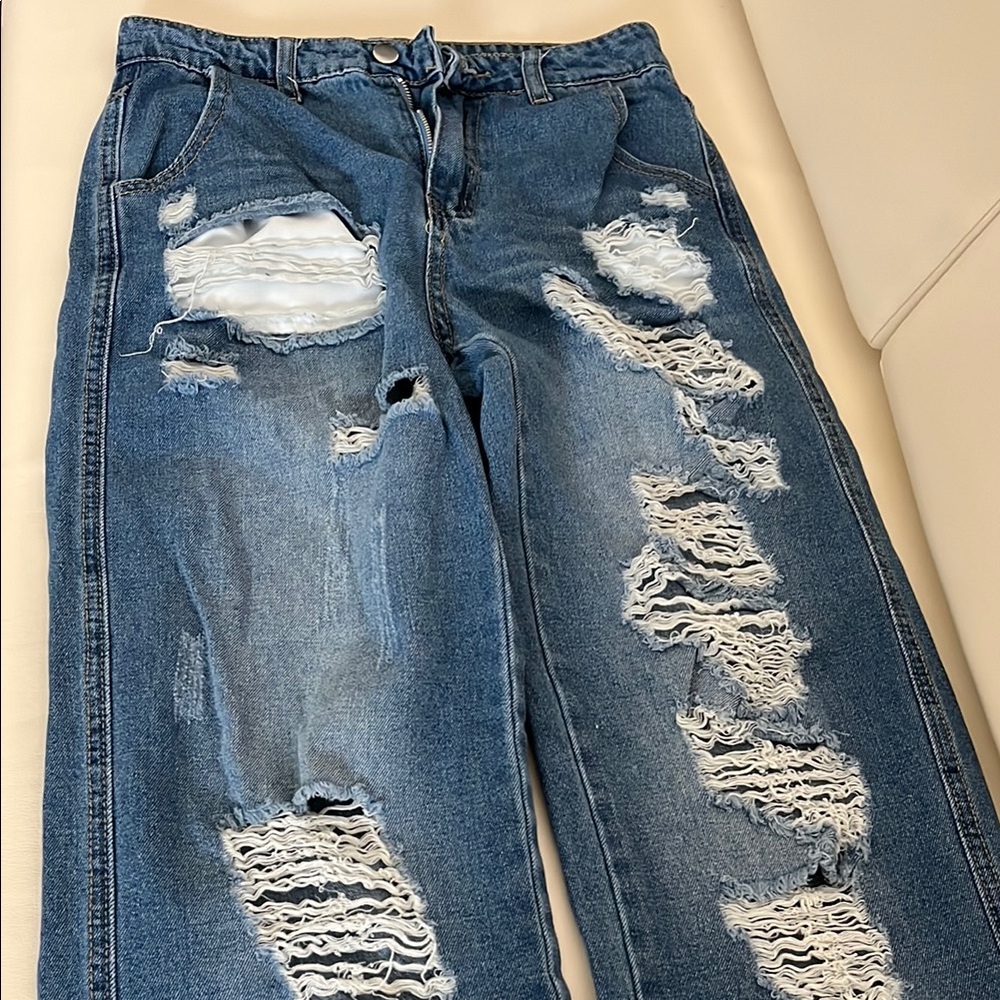 Distressed Blue Denim Jeans